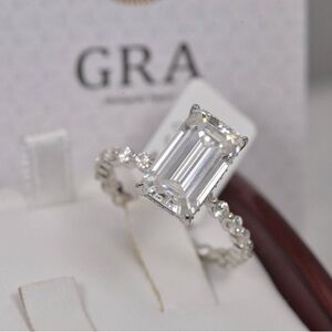 5 Karat Solitaire Emerald Cut Halo 14K White Gold Set On .925 Sterling Silver